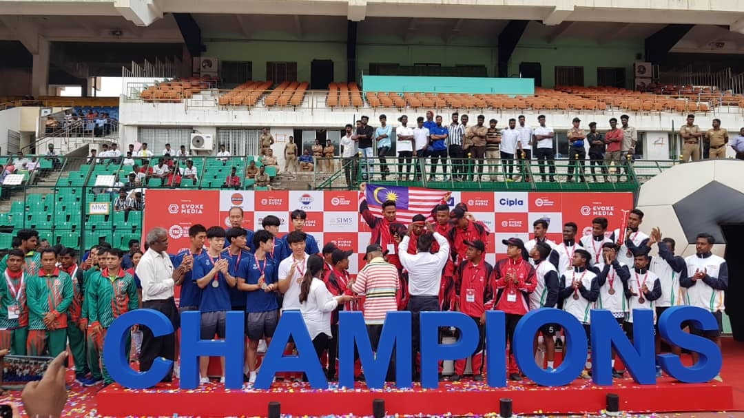 Special Olympics Malaysia Team Receiving Gold Medal