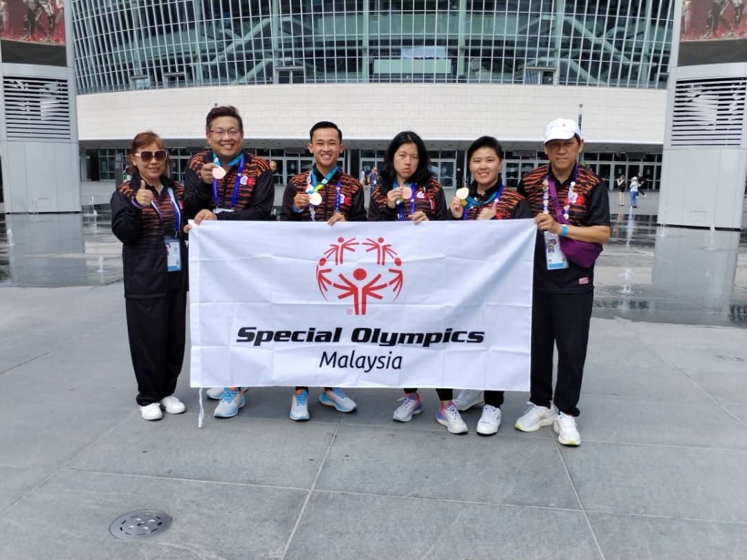 Bowling Unified team with the Coaches